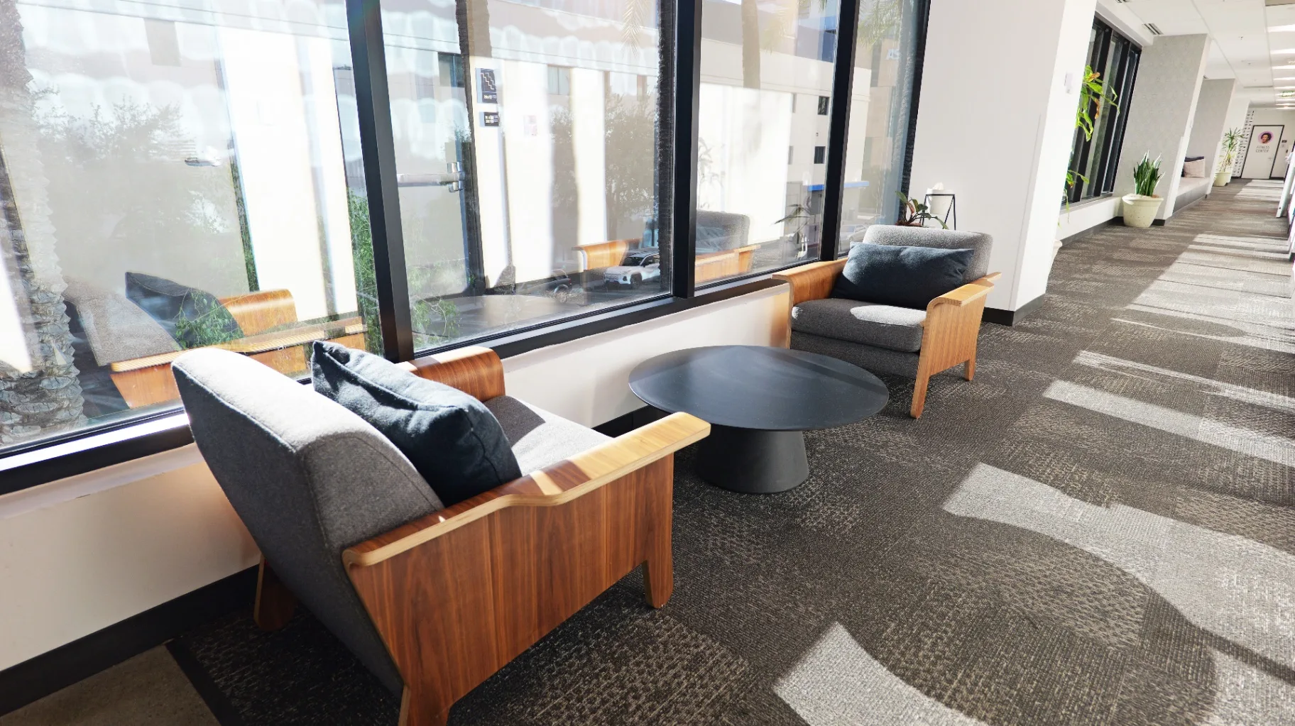 Hallway lounge seating with downtown views